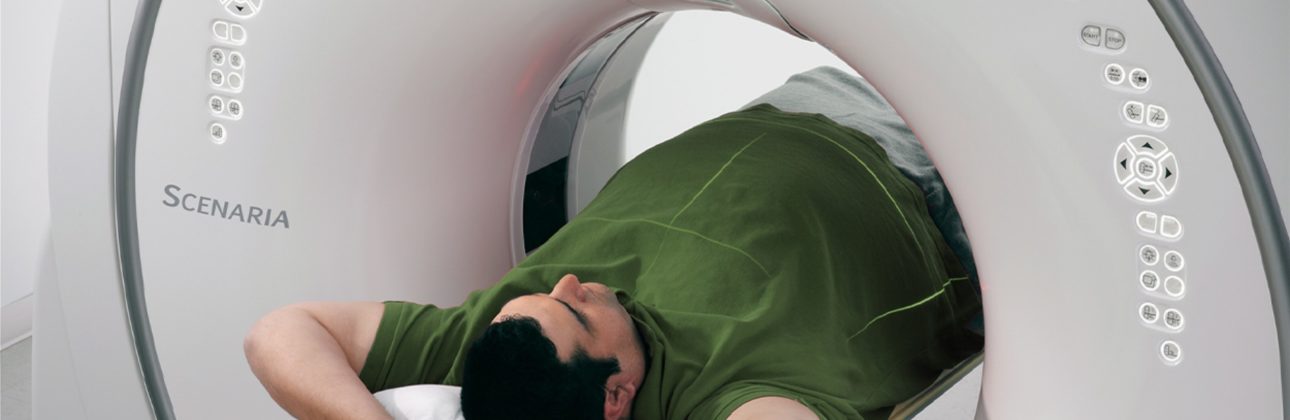 Patient inside a wide bore MRI machine