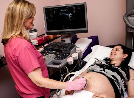 technician and patient undergoing an ultrasound