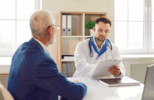 A healthcare provider preparing a patient for his DEXA bone density scan by talking about what to expect.