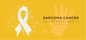 A yellow banner with an outline of a hand over an awareness ribbon for SARCOMA CANCER AWARENESS MONTH JULY.